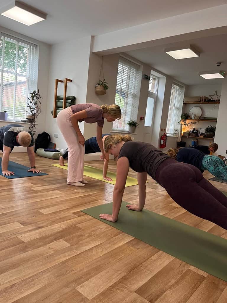 student teacher instructing fellow students in the Pilates Teacher Training course at shine at The Hollies